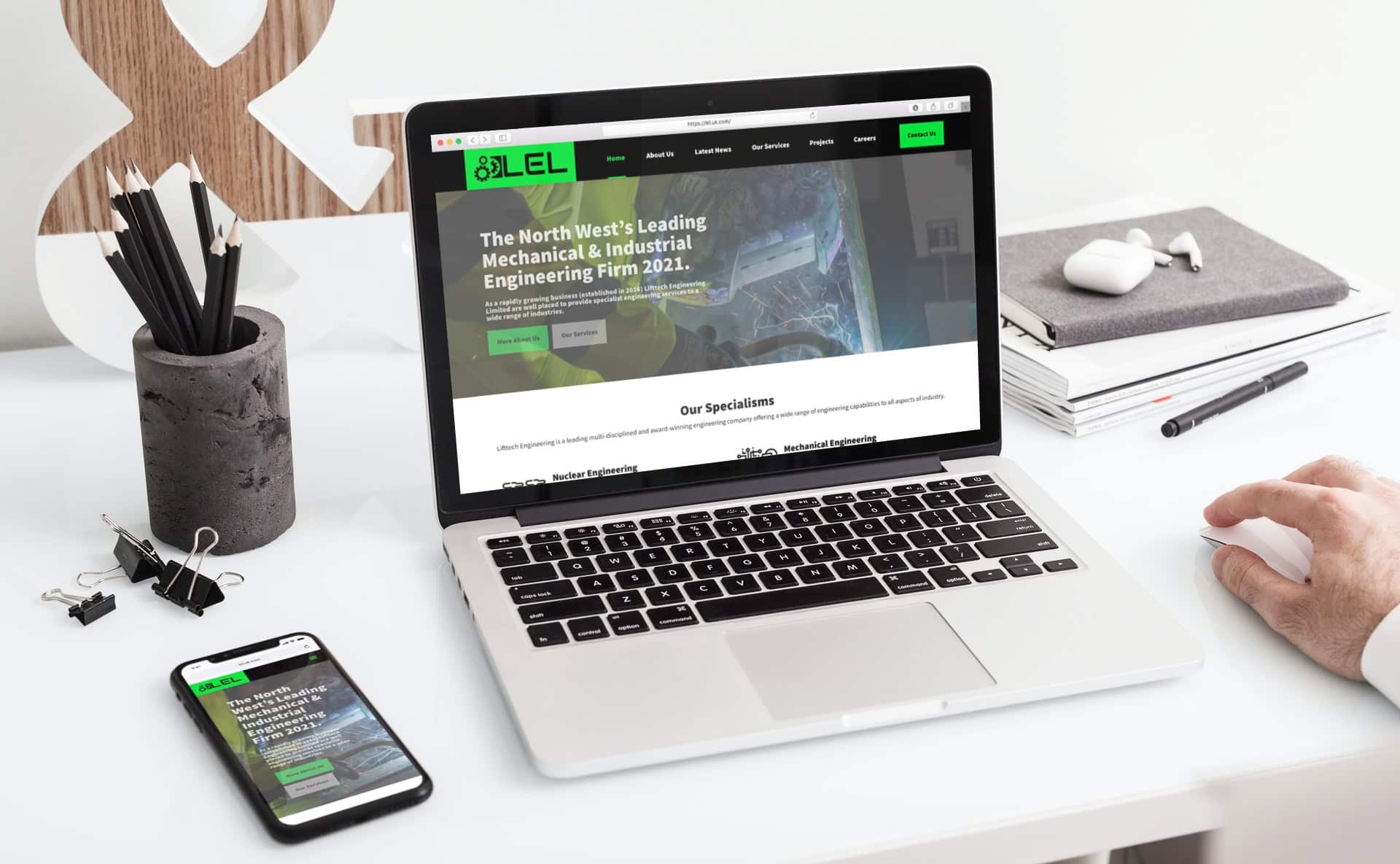 lel site mockup on laptop and iphone